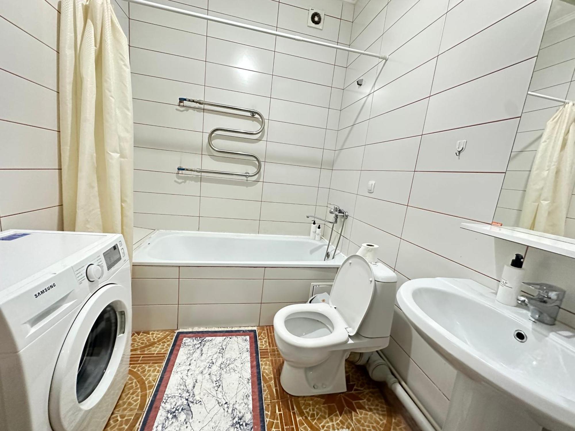 Apartment комфортабельная 2-х комнатная в 100м от метро алатау Almaty